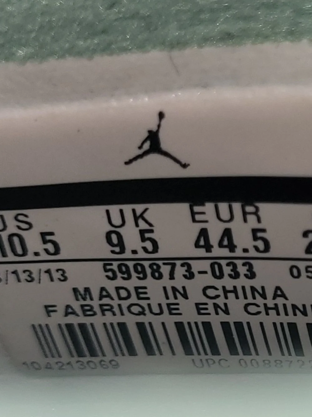 Jordan 1 Retro Black and Mint Green Glow Hi-Top Sneakers